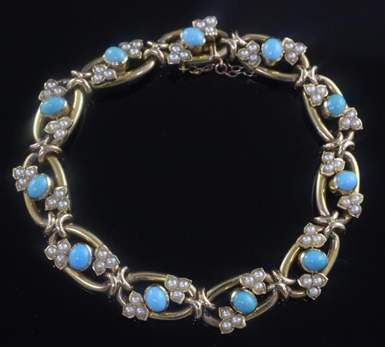 A late Victorian 15ct gold, seed pearl and turquoise set oval link bracelet, approx. 6.5in.